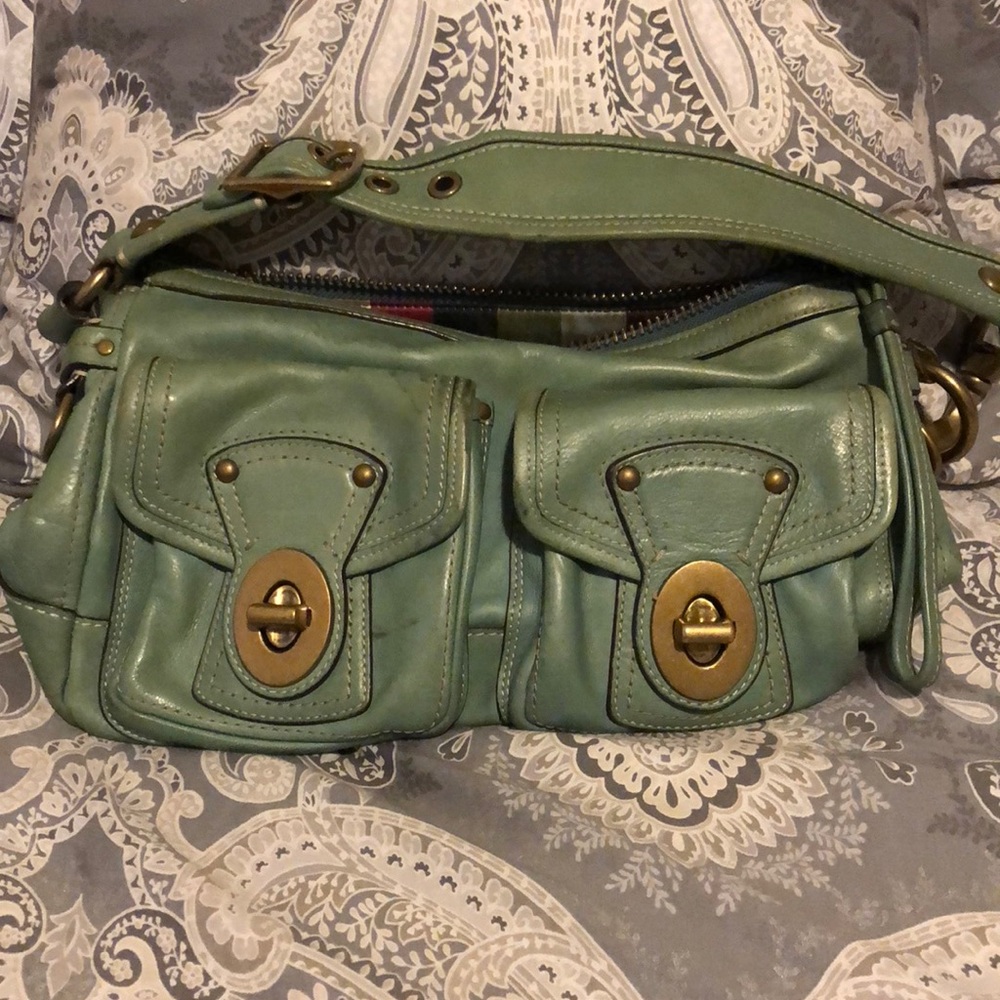 Light teal green coach tote.